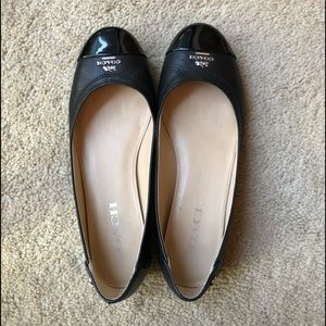 Coach Black leather flats.